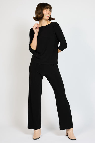 Model wearing Voyager Palazzo in Black with matching Voyager 3/4 Boat Neck Top in Balck