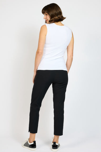 Model wearing White Jersey Tank with Black Nat slim pants and sneakers